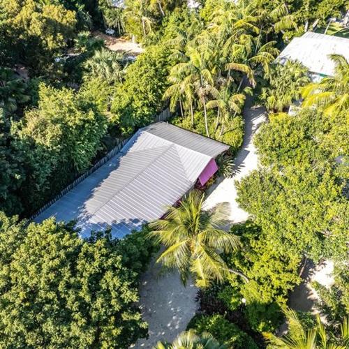 an overhead view of a building in a forest of trees at Little Bay Compound in Islamorada