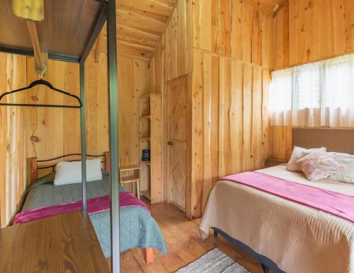 Cedrela Eco-Lodge & Restauranteにあるベッド