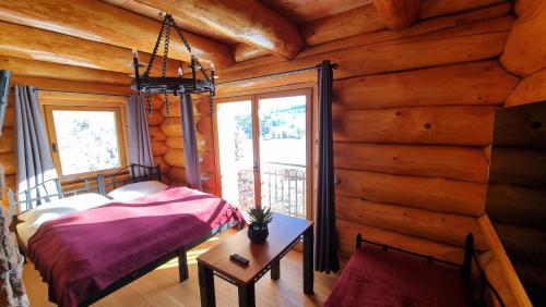 Postel nebo postele na pokoji v ubytování Penzion Srub Panorama