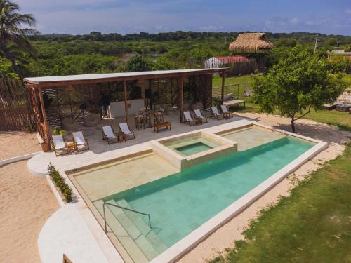 an overhead view of a swimming pool in a house at Vista Mare Beach House in Tierra Bomba