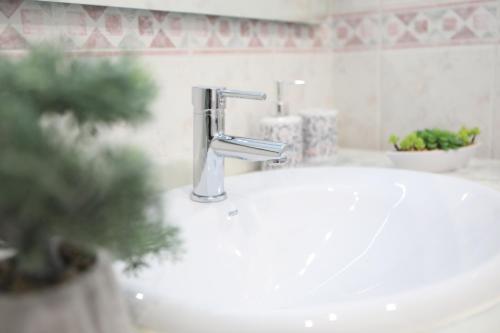 a sink with a faucet in a bathroom at Vista Bonita - Beautiful View!!! in Santa Pola