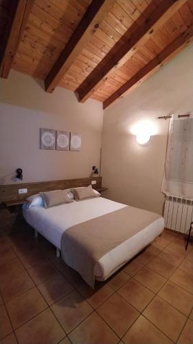 Postel nebo postele na pokoji v ubytování Apartaments Beta