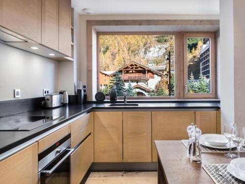 Duplex rénové avec parking, proche centre et remontées, navette et bus à deux pas