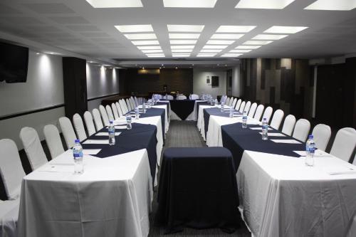 a row of tables and chairs in a conference room at LaiLa Hotel CDMX Reforma in Mexico City