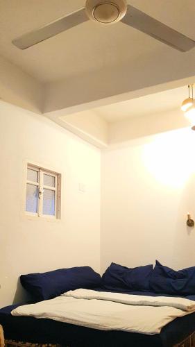 Katil atau katil-katil dalam bilik di HabuHeritageHomeStayInLuxor