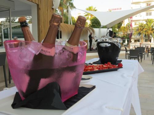 two bottles of champagne in a bucket on a table at BG Pamplona in Playa de Palma