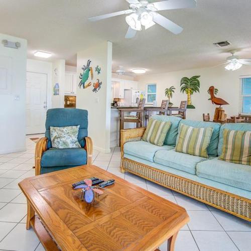 a living room with a couch and a table at Little Bay Prime in Islamorada