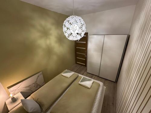 A bed or beds in a room at Travel Studio