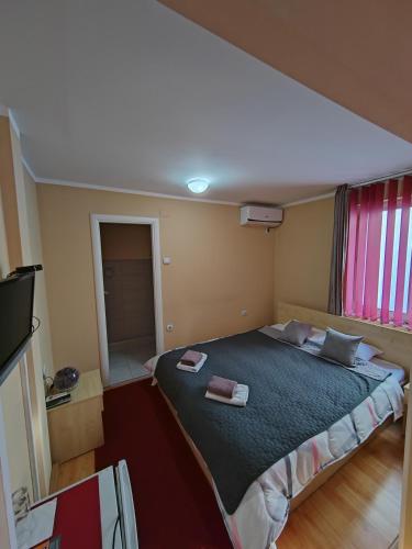 Postel nebo postele na pokoji v ubytování Bed and Breakfast Majesty