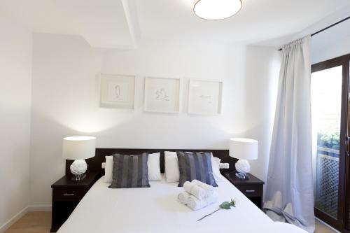 Кровать или кровати в номере Happy Apartments