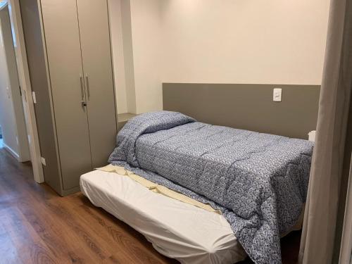 Postel nebo postele na pokoji v ubytování Luxo Capivari - Gaudi Loft Design