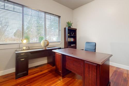a home office with a desk and a window at Marysville Modern Oasis in Marysville
