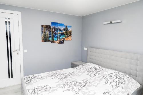 Ένα ή περισσότερα κρεβάτια σε δωμάτιο στο Melody Hotel
