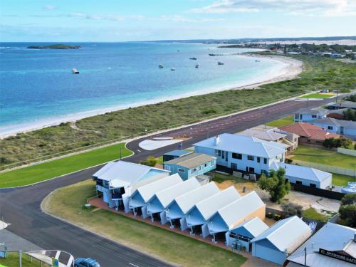 an aerial view of a beach with buildings and the ocean at Windsurfer beach Chalet 1 in Lancelin