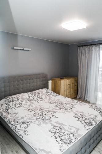 Ένα ή περισσότερα κρεβάτια σε δωμάτιο στο Melody Hotel