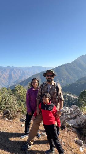 a group of people standing on top of a mountain at Ananta Prana in Mussoorie