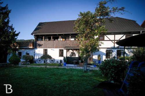 a house with a yard in front of it at Barinka in Světec