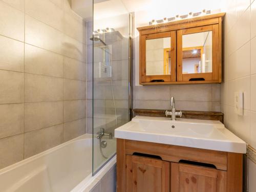 a bathroom with a sink and a shower at Appartement Val-d'Isère, 3 pièces, 4 personnes - FR-1-694-327 in Val-d'Isère