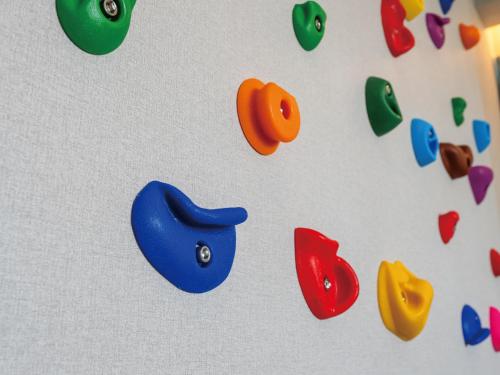 a group of colorful plastic shapes on a white surface at Family Condo Chatan Hills by Coldio Premium in Chatan