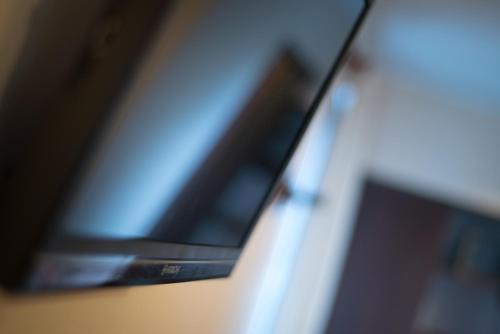 a close up of a side view mirror of a car at Hotel Austral Ushuaia in Ushuaia