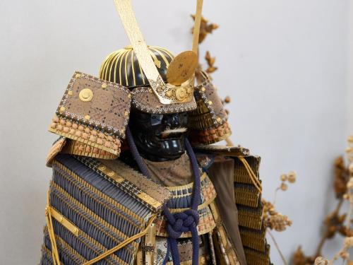 a statue of a samurai wearing a helmet at Tabist Nikkokinugawa Onsen Kiyomizu no Yado in Nikko