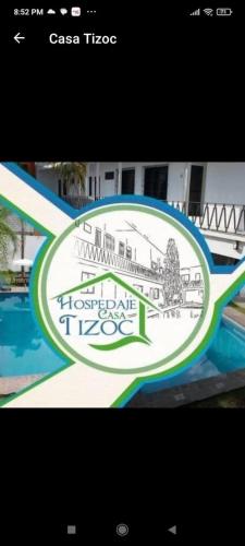 a sign with a picture of a building at Casa Tizoc Hospedaje in Jiutepec
