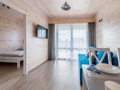 Postel nebo postele na pokoji v ubytování Cozy, wooden holiday homes with terraces