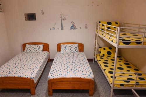 Cama o camas de una habitación en Carlos Backpacker