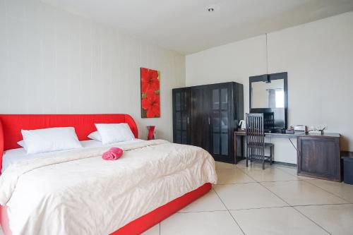 Postel nebo postele na pokoji v ubytování Queen Rose Villa & Spa