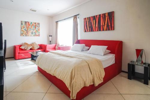 Postel nebo postele na pokoji v ubytování Queen Rose Villa & Spa