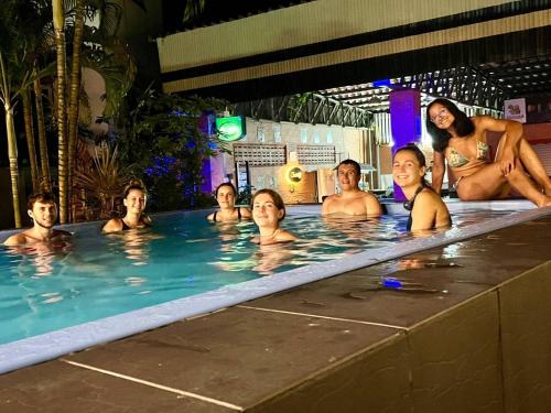 a group of people in a swimming pool at Pak-Up Hostel in Krabi town
