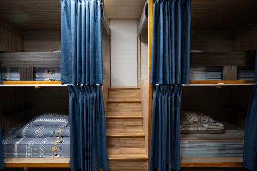 Cama o camas de una habitación en Carlos Backpacker