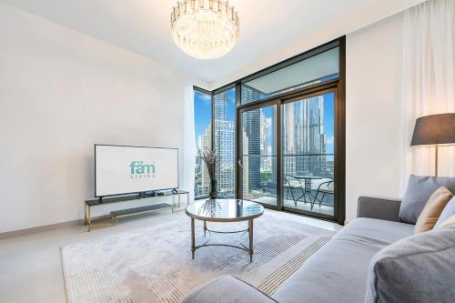 Posezení v ubytování FAM Living - Cityscape Charm: 2BR Apartment with Burj khalifa View