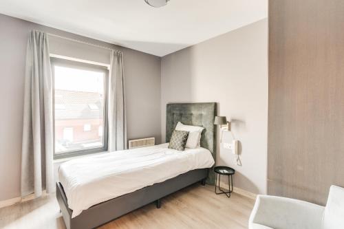 Ένα ή περισσότερα κρεβάτια σε δωμάτιο στο Hotel Italia