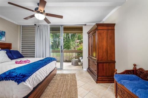 Ένα ή περισσότερα κρεβάτια σε δωμάτιο στο Kona Mansions#124
