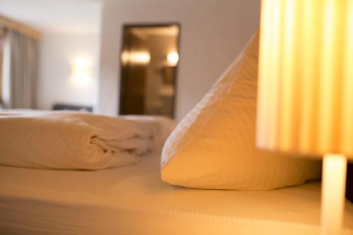 a close up of a bed in a hotel room at Haus Barbara in Alpbach