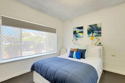 Postel nebo postele na pokoji v ubytování The Cosy Corner - Your Chic Adelaide Base