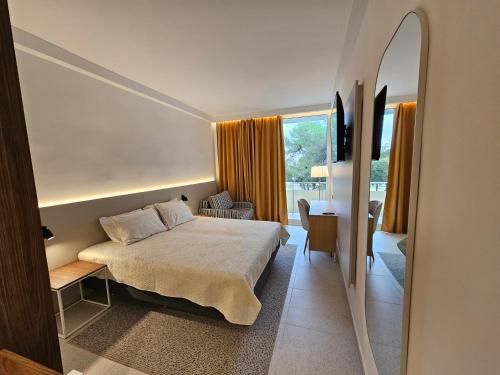 Postel nebo postele na pokoji v ubytování Family Hotel Adria - All inclusive