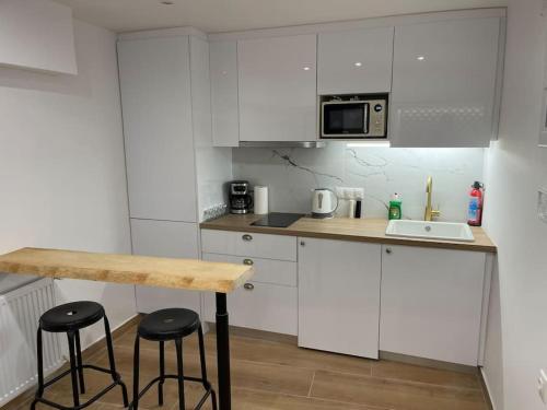 Kuchyň nebo kuchyňský kout v ubytování Hideaway Boutique