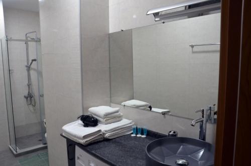 Koupelna v ubytování Season Suite Apart-Hotel