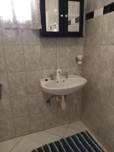 Ένα μπάνιο στο Scholtz Self-catering Accommodation