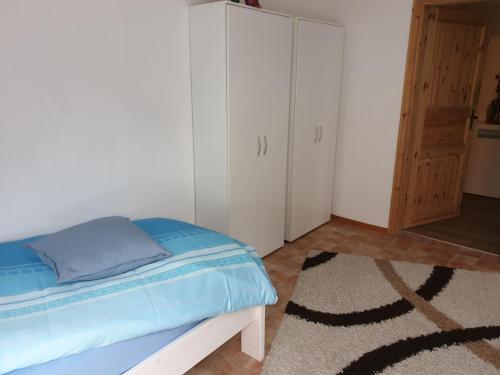 Postel nebo postele na pokoji v ubytování NEU! FeWo Maya mit Sauna
