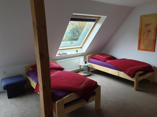 Postel nebo postele na pokoji v ubytování NEU! FeWo Maya mit Sauna