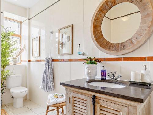 a bathroom with a sink and a mirror at 1 Bed in Gulval 88293 in Gulval