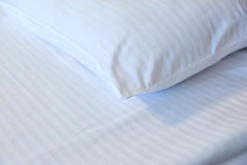 Letto o letti in una camera di Safrano Palace