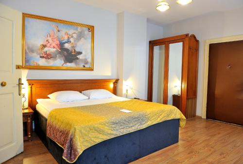 Letto o letti in una camera di Safrano Palace