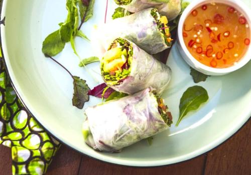 a plate of food with sandwiches and a bowl of soup at Concierge Hotel in Durban