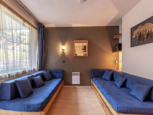 Appartement La Plagne, 1 pièce, 4 personnes - FR-1-353-63にあるシーティングエリア