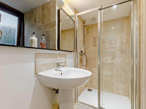 a bathroom with a sink and a shower at 1 Bed in Tavistock HGARD in Marytavy