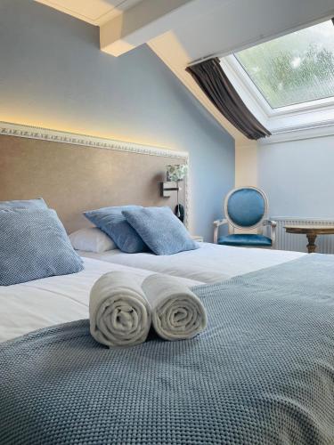 Letto o letti in una camera di Landgoedhotel Villa Vennendal